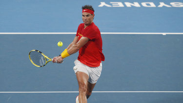 Rafael Nadal of Spain plays a shot against Alex de Minaur of Australia during their ATP Cup tennis match in Sydney in 2020.