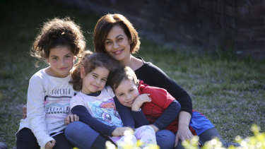 Theodora Hatzihrisafis at home with her three children, Petra, 9, Mina, 4 and Steven, 5.