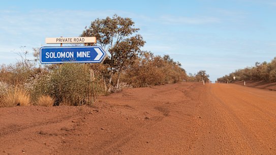 The Solomon Mine sign in the Pilbara Region of Western Australia, on the outskirts of Karijini National Park.
