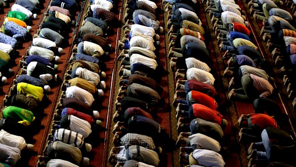 Muslims in Indonesia perform an afternoon prayer during Ramadan. 