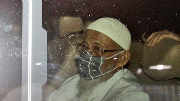 Islamist cleric Abu Bakar Bashir sits inside a van as he leaves Gunung Sindur Prison in Bogor, West Java, Indonesia, on Friday.