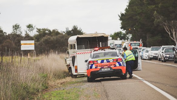 Traffic banked up as police respond to an accident involving a horse float on the Barton Highway.
