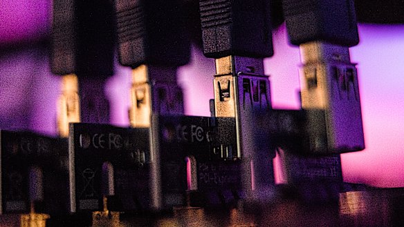 USB cables inside a 'mining rig' computer, used to mine cryptocurrency: Entrepreneurs are offering new digital coins at a torrid pace reminiscent of the Bitcoin boom three years ago. 