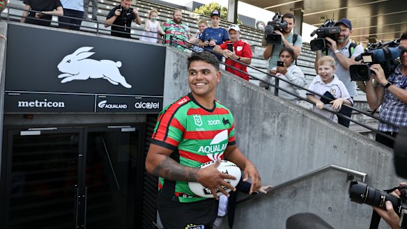 Latrell Mitchell checks in at Redfern in December.