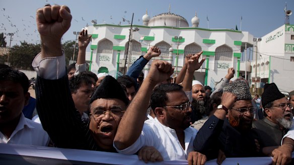 Indian Muslim men protest against the draft bill last year.