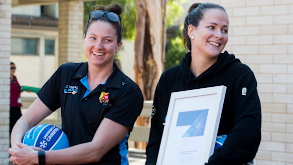 Kelsey Griffin and Keely Froling on hand as the Canberra Capitals are announced as 2019 Canberra Citizen of the year.