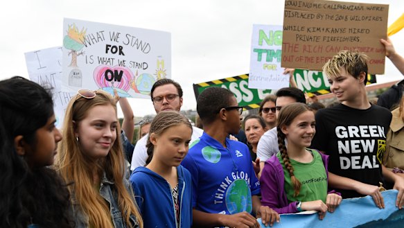 Young climate activists including Greta Thunberg, take their message to Donald Trump's doorstep.