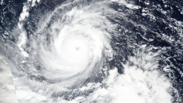 Typhoon Mangkhut churns west towards the Philippines.