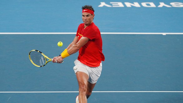 Rafael Nadal of Spain plays a shot against Alex de Minaur of Australia during their ATP Cup tennis match in Sydney in 2020.