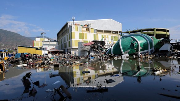 The damage to a shopping mall and mosque are visible following earthquakes and tsunami in Palu.