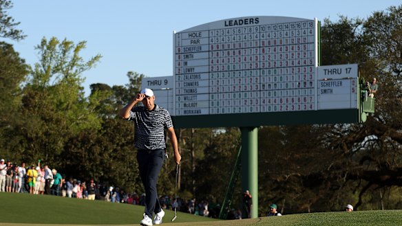 Scottie Scheffler walks up the 18th green before his bizarre four putt double bogey.