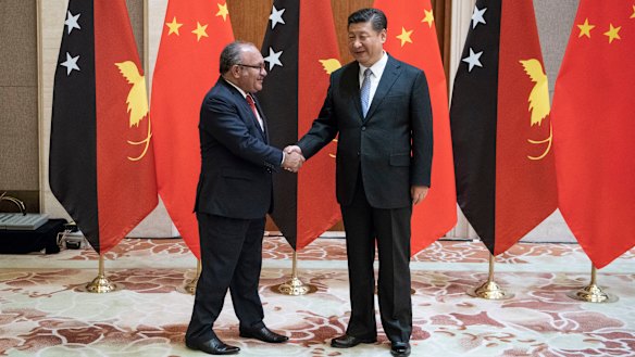 PNG leader Peter O'Neill meets Xi Jinping in Beijing on June 21. China is increasing its influence in PNG.