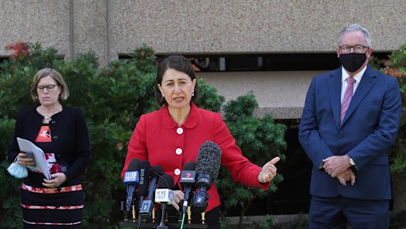 NSW Premier Gladys Berejiklian, with Chief Health Officer Kerry Chant and Health Minister Brad Hazzard, announce the easing of Sydney's lockdown restrictions for the Christmas period.