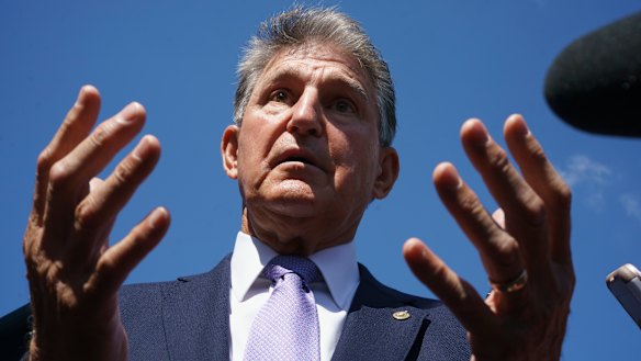 The whole world in his hands? Democratic Senator Joe Manchin has helped torpedo a centrepiece of the Democratic Party’s economic agenda.