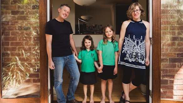 Canberra architect Robbie Gibson has invested into SolarShare, a community run solar farm. Mr Gibson is pictured with his wife Karin Gustavsson, and their children Nelly, 6, and Freya, 9.