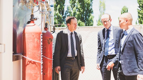 From left: Minister for Climate Change and Sustainability Shane Rattenbury, Energy Networks Australia's Andrew Dillon, and Evoenergy gas networks manager William Yeap at the opening of a hydrogen gas test facility. 