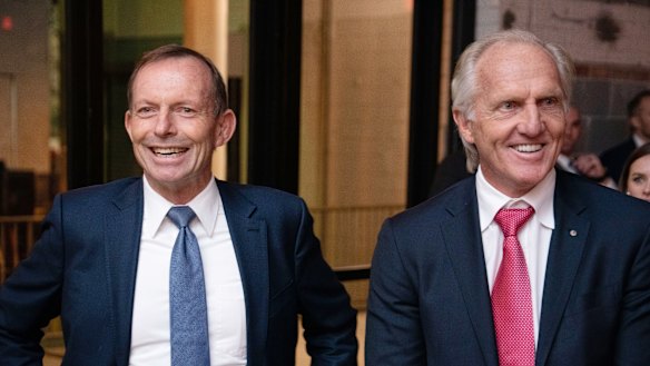 Former Australian prime minister Tony Abbott and Australian golfer Greg Norman at the farewell party of Australia's ambassador to the United States of America, Joe Hockey, in Washington DC.