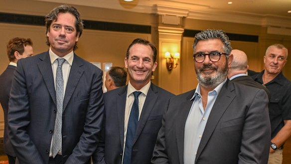 Former AFL CEOs Gillon McLachlan (left) and Andrew Demetriou (right) with current league boss Andrew Dillon at Neil Mitchell’s departure from 3AW Mornings last year.