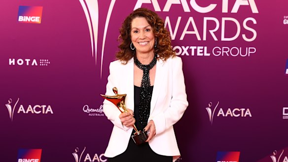 Kitty Flanagan poses with the AACTA Award for best acting in a comedy for Fisk.