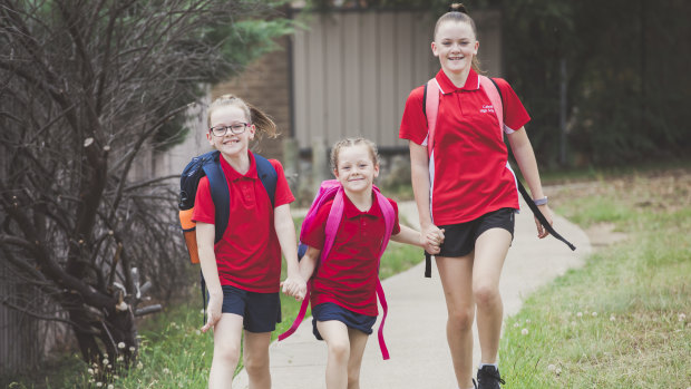 Keira James (right), who is heading into Year 7 this year, pictured with two of her three sisters Ashlyn, 9 (left) and Bronte, 8.
