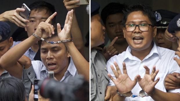 In this combination file image made from two photos, Reuters journalists Kyaw Soe Oo, left, and Wa Lone, are handcuffed as they are escorted by police out of the court in Yangon, Myanmar on September 3.