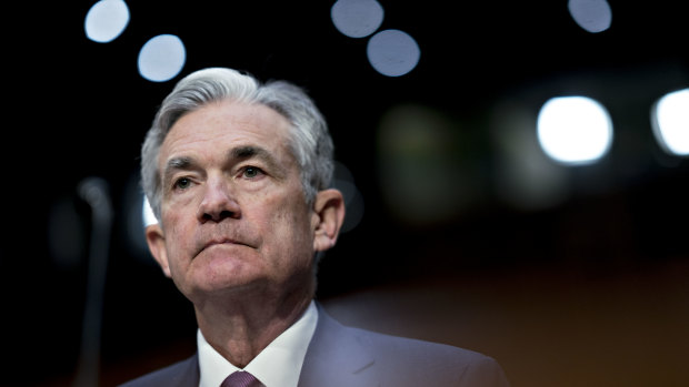 Wall Street lost ground late in the session after the President said he was 'not thrilled' with Fed chief Jerome Powell.