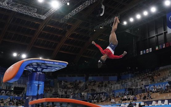 Simone Biles performs on the vault before her withdrawal.