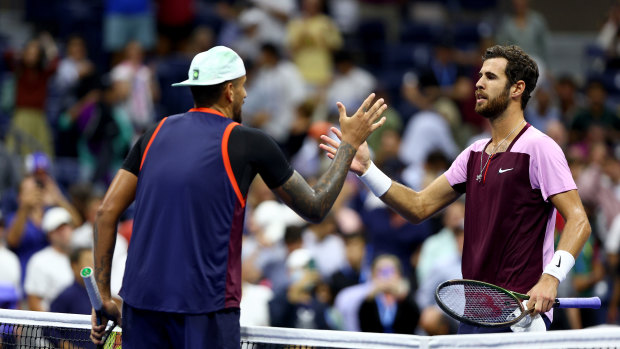 Karen Khachanov and Nick Kyrgios shake hands after the quarter-final.