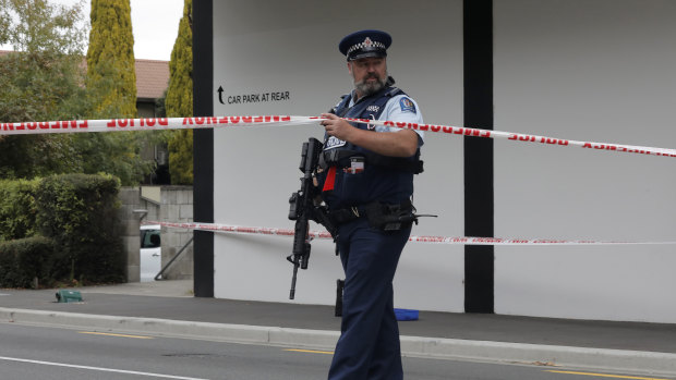 A police officer stands guard near the Masjid Al Noor mosque in Christchurch.