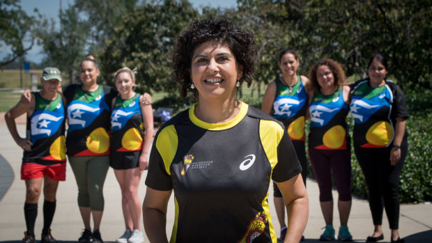 Front: ActewAGL general manager retail Ayesha Razzaq. Rear from left: Tuggeranong and Queanbeyan Deadly Runners Denis Reid, Jess Skipper, Jess Martin, Louise Lippitt, Tamsin Porter and Cara Smith.