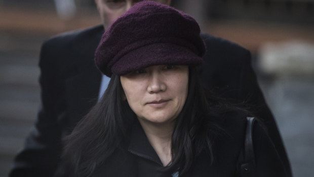Huawei chief financial officer Meng Wanzhou leaves her home to attend court  in Vancouver last month.
