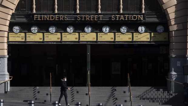 Flinders Street Station in Melbourne. The OECD says the Victorian lockdown has forced it to downgrade its forecasts for the Australian economy in 2021.