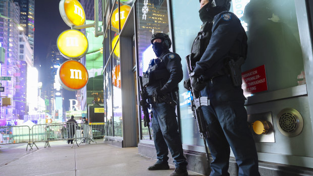 Members of the New York Police Department Emergency Services Unit patrol the Times Square area of New York on New Year's Eve.