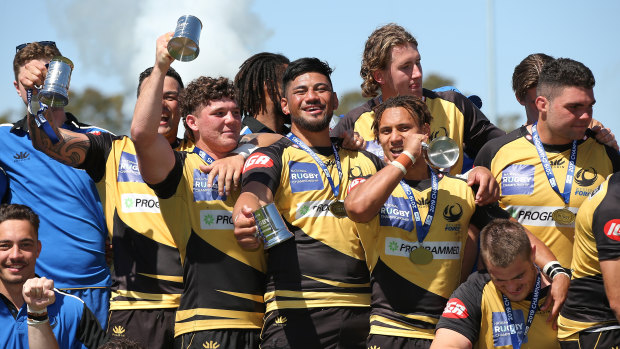 Force players celebrate winning the NRC grand final against the Canberra Vikings at the University of Western Australia Sports Park.