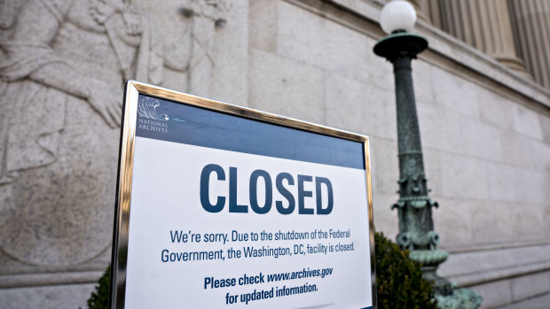 A sign announcing the closure of the National Archives due to a partial government shutdown.