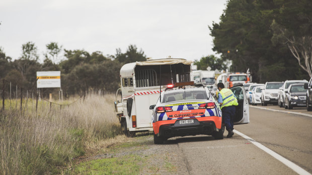 Traffic banked up as police respond to an accident involving a horse float on the Barton Highway.