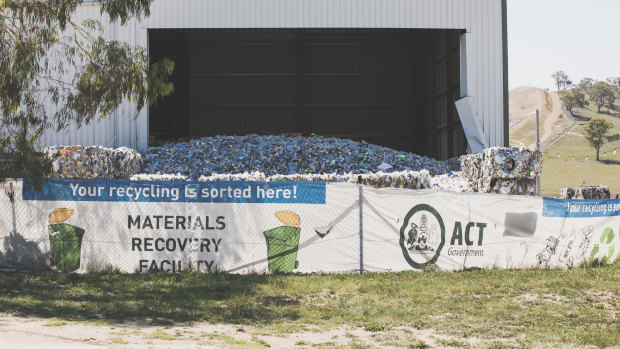 A mountain of plastic was seen overflowing from the Hume recycling facility's doors during the shutdown.