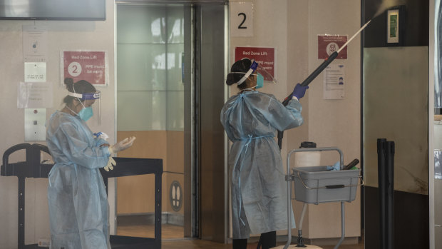 Cleaners wearing full PPE at the Holiday Inn this week.