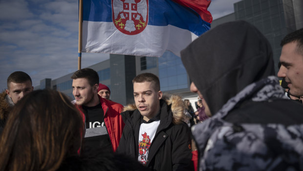Petar Civkovic, a supporter of Novak Djokovic, speaks outside the VIP exit of Belgrade’s international airport.
