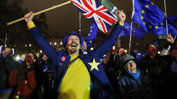 Anti-Brexit protesters react to the historic vote outside Parliament.