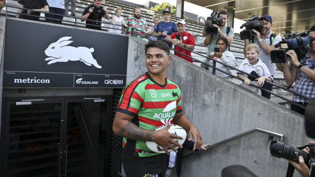 Latrell Mitchell checks in at Redfern in December.