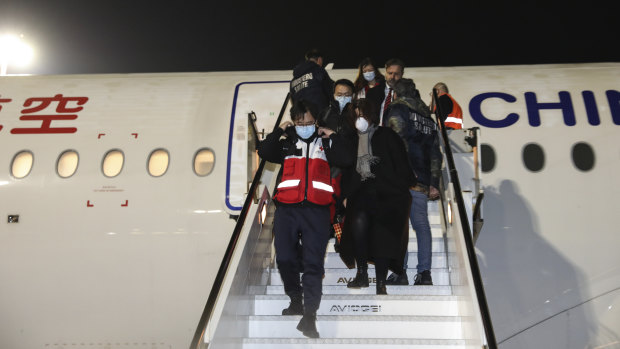 A Chinese aid team arrives at Fiumicino Airport in Rome, carrying members of a medical team and several tons of medical supplies.