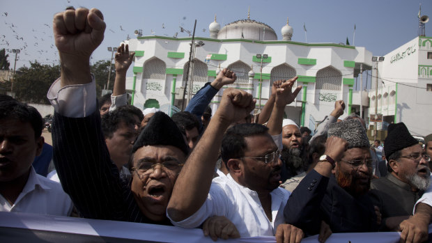 Indian Muslim men protest against the draft bill last year.