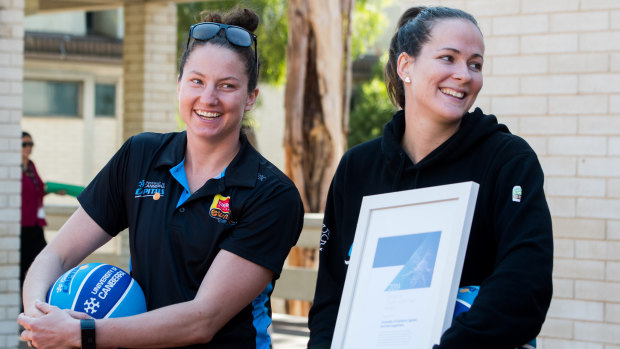 Kelsey Griffin and Keely Froling on hand as the Canberra Capitals are announced as 2019 Canberra Citizen of the year.