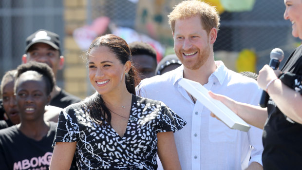 Harry and Meghan visit a township during their royal tour of South Africa.