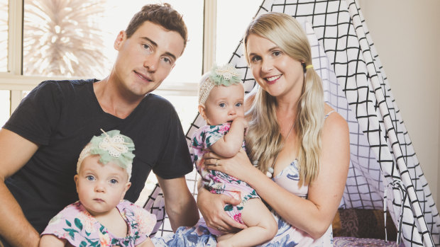 Luke and Teri Greenhalgh at home in Canberra with their twins Dahli and India, who were born premature but are now thriving.