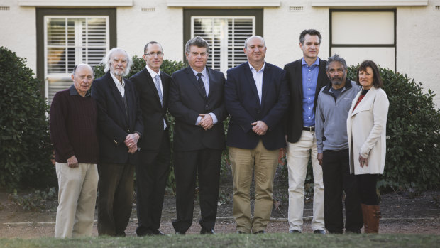 Canberra doctors are demanding public hearings in an upcoming inquiry into the ACT's health system.
From left, Dr Alan Schroot, Dr Peter Hughes, Dr Richard Singer, Executive officer of ASMOF ACT Stephen Crook, Dr Antonio Di Dio, Dr Stuart Berry, Dr John Tharion, and Dr Suzanne Davey.