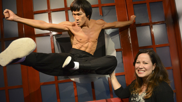 Shannon Lee with a waxwork depiction of her father, the iconic Bruce Lee.