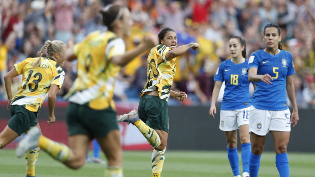 Matildas captain Sam Kerr (centre) celebrates during the match against Brazil.