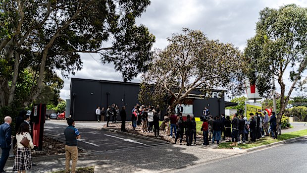 The crowd at the auction of the East Burwood KFC.